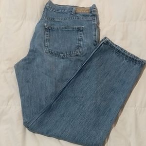 Well worn faded Kirkland Signature blue  jean 36W